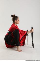 Katerina Ninja Kneeling Pose